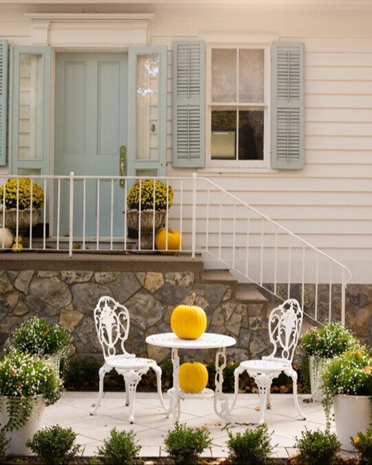 DelicatePastel Colours and Soft Plantings elevate this courtyard Bistro Patio